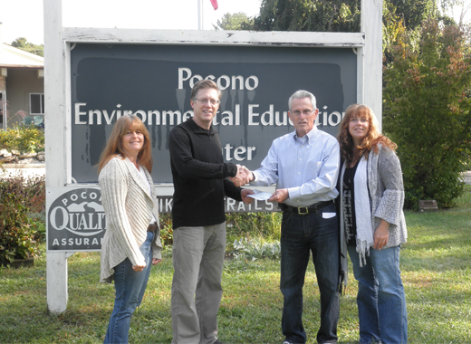 peec accepts a generous donation from saw creek estates